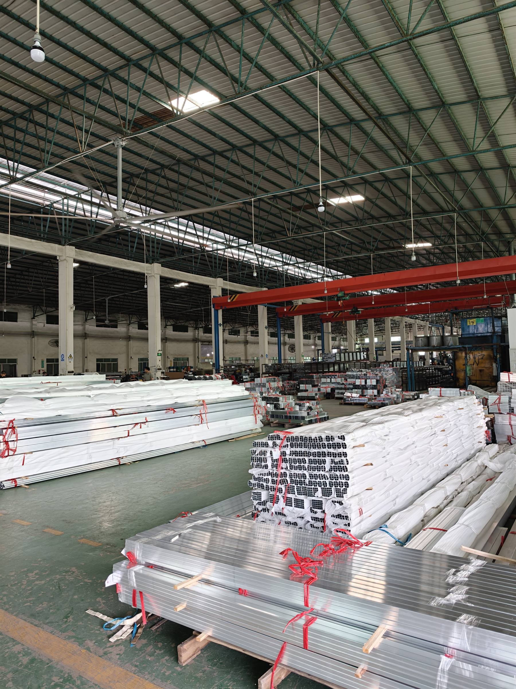 Packaged aluminum profiles staged in the despatch warehouse