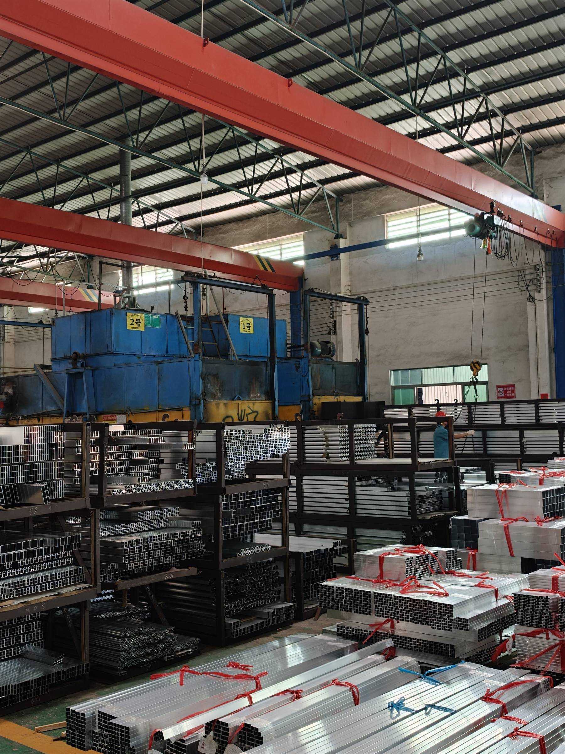 Profile storage racks beside the ageing furnaces